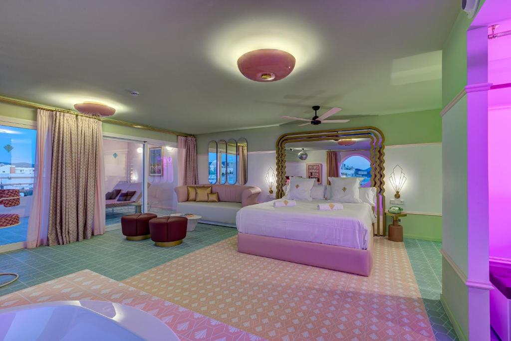 Postel nebo postele na pokoji v ubytování Grand Paradiso Ibiza - Adults Only