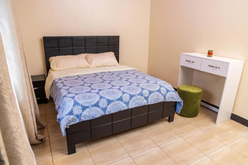 Un pat sau paturi într-o cameră la Siima’s hideout a