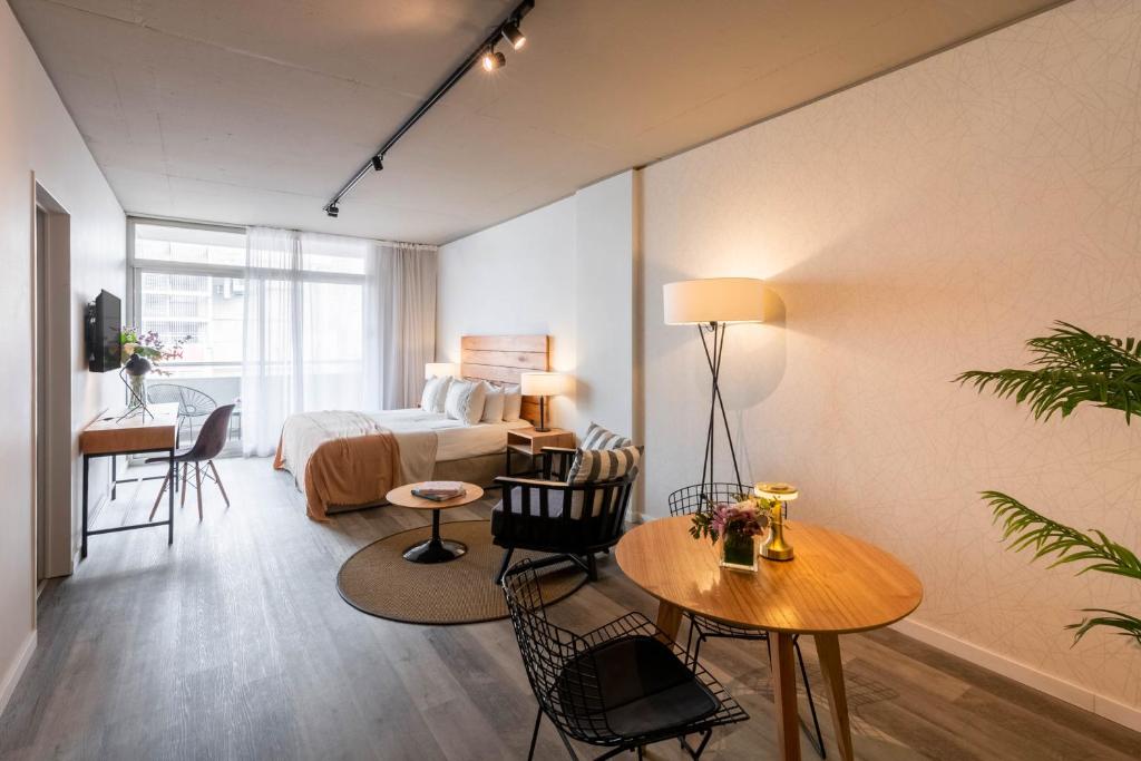 TV a/nebo společenská místnost v ubytování Top Rentals Montañeses