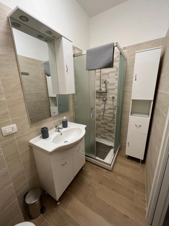 a bathroom with a sink and a shower at La casa di Maria in Rapallo