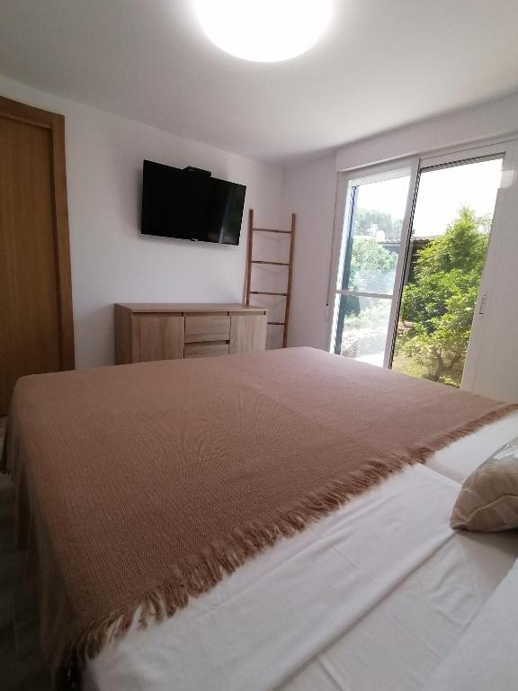 Postel nebo postele na pokoji v ubytování Villa Isabelle
