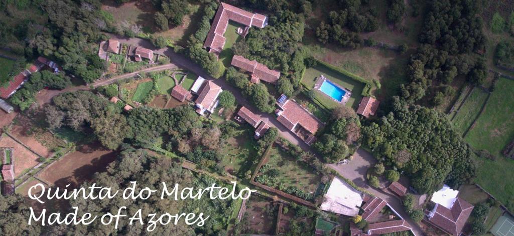 an overhead view of a yard with trees and houses at Quinta Do Martelo in Angra do Heroísmo