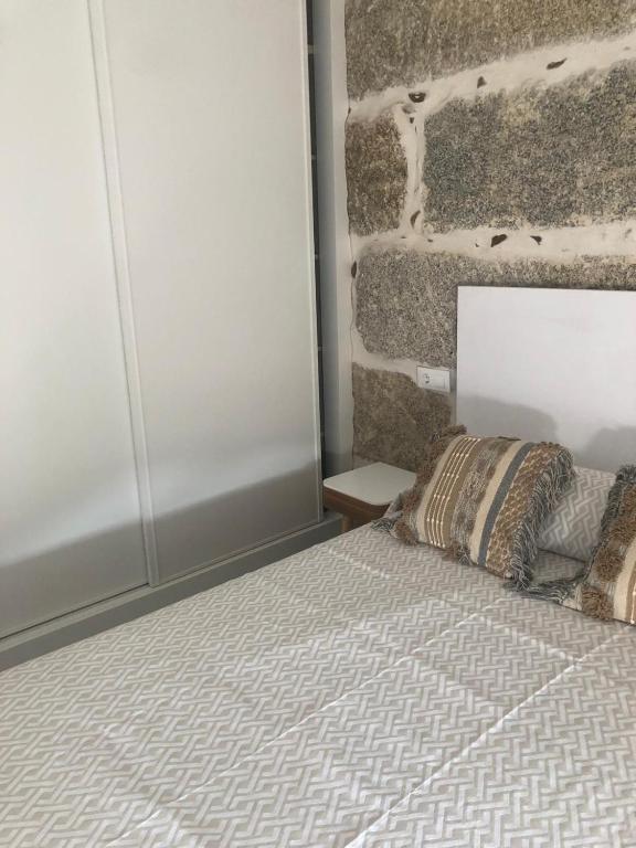Postel nebo postele na pokoji v ubytování A esmorga