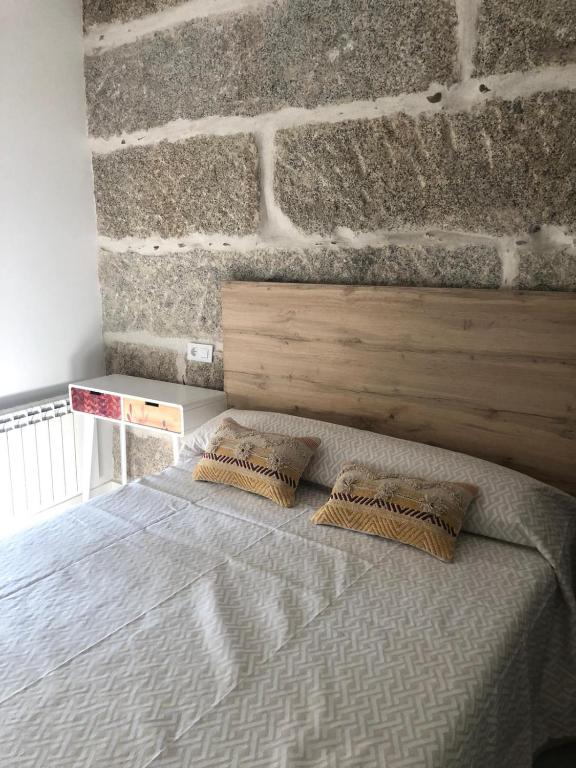 Postel nebo postele na pokoji v ubytování A esmorga