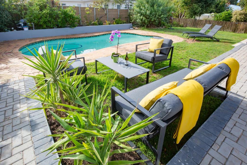 a view of a pool with a water cannon at Casa iLanga guesthouse in Somerset West