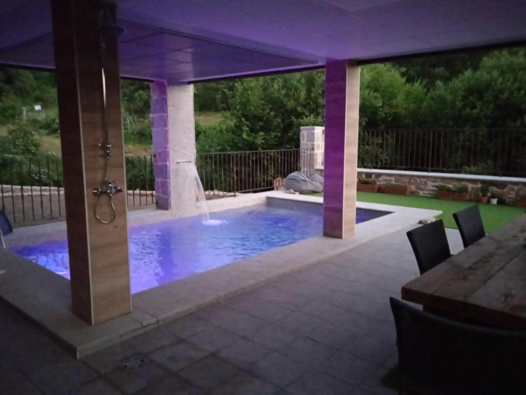 The swimming pool at or close to Raices