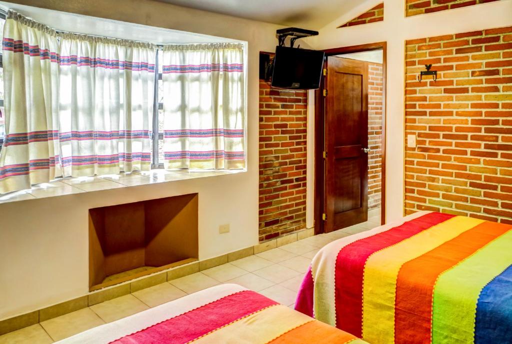 Postel nebo postele na pokoji v ubytování Villas Xänthe
