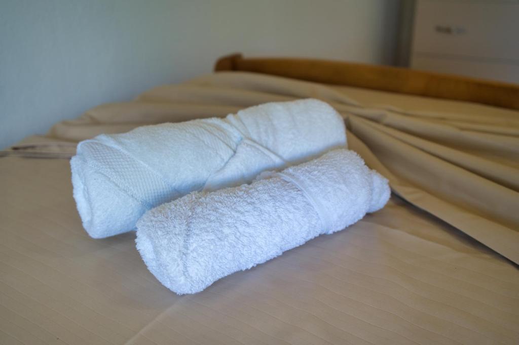 Letto o letti in una camera di VILA SHAMETAJ