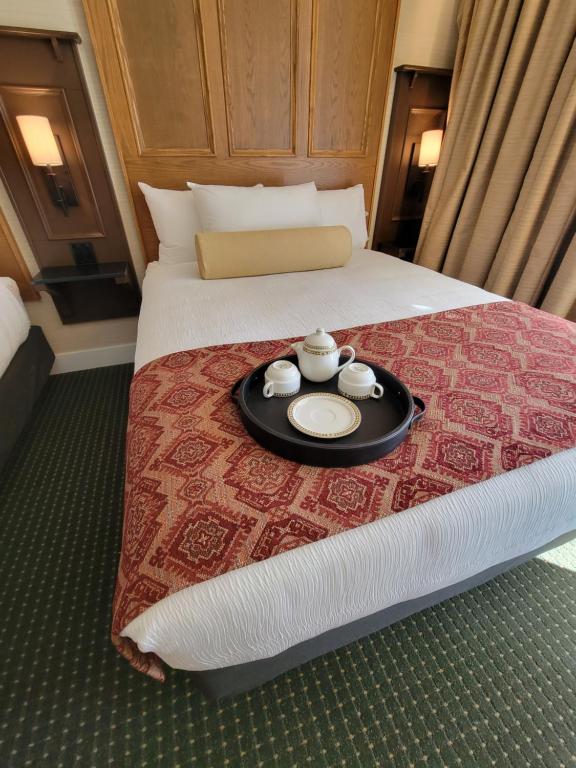 Postel nebo postele na pokoji v ubytování Kilmorey Lodge