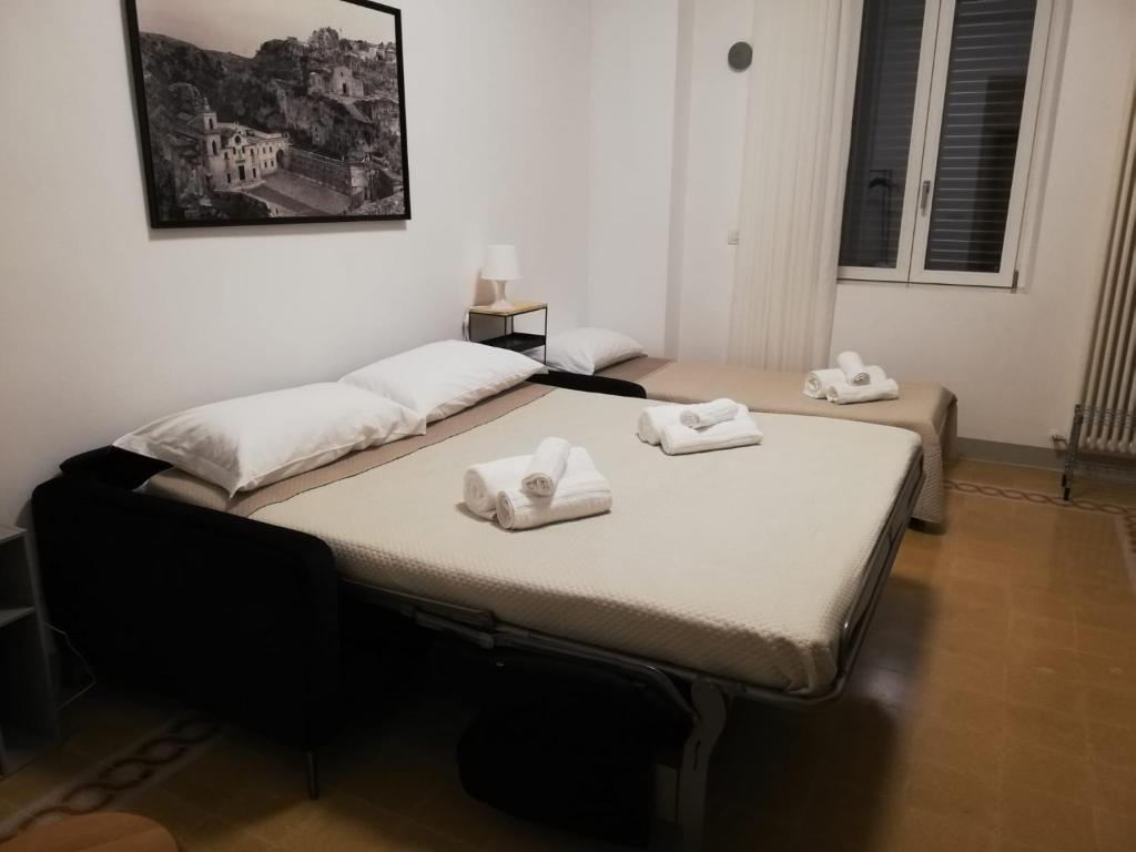 Postel nebo postele na pokoji v ubytování Apartments for you 2