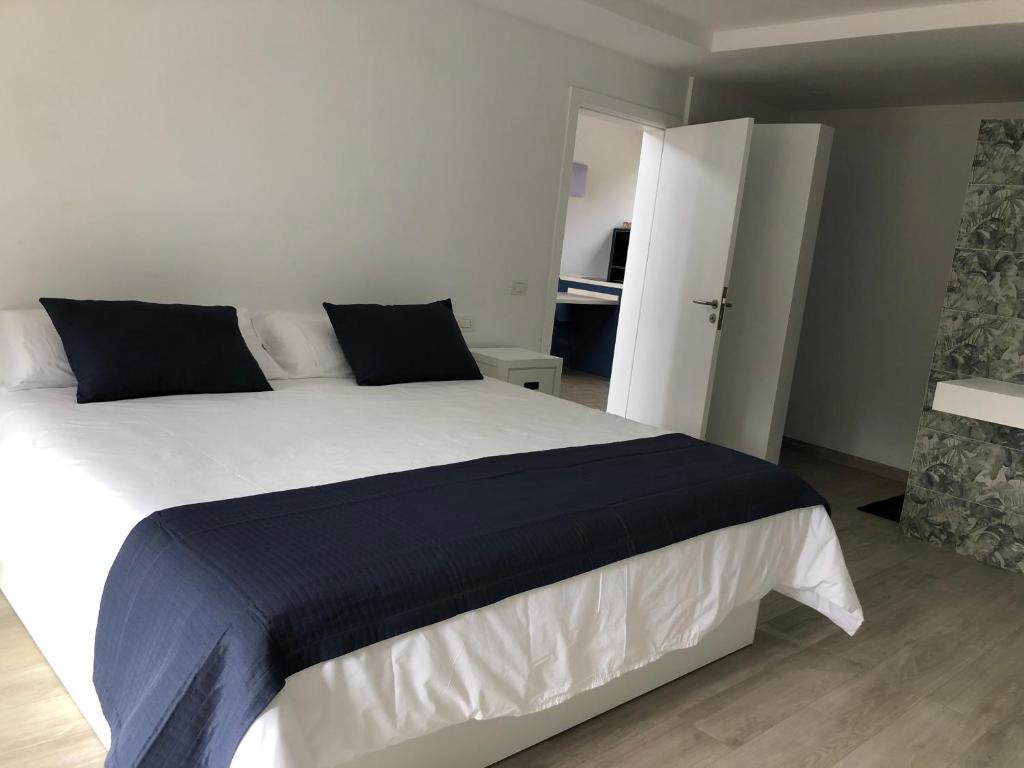 Postel nebo postele na pokoji v ubytování Vivienda vacacional Agripina