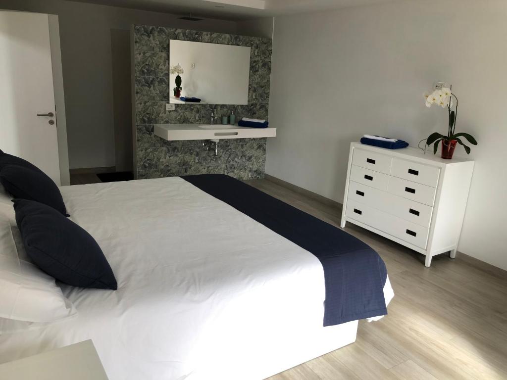 Postel nebo postele na pokoji v ubytování Vivienda vacacional Agripina