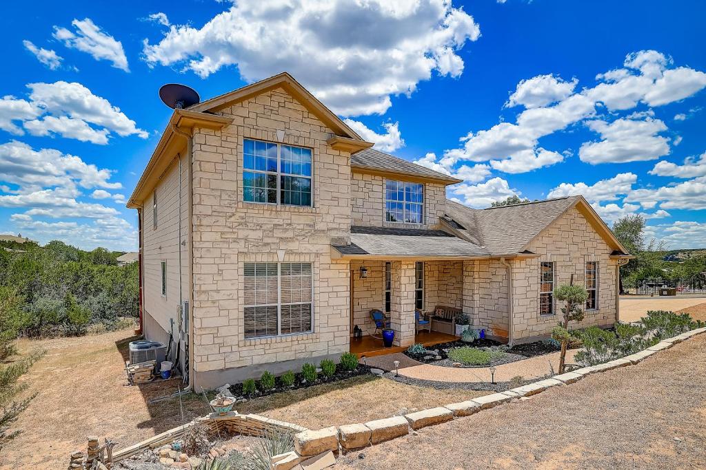 a house in the middle of a field at Hill Country Haven in Lago Vista