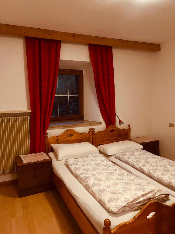 Postel nebo postele na pokoji v ubytování Bruggerhof