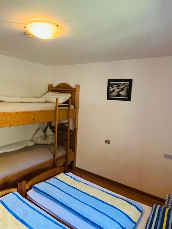 Postel nebo postele na pokoji v ubytování Bruggerhof