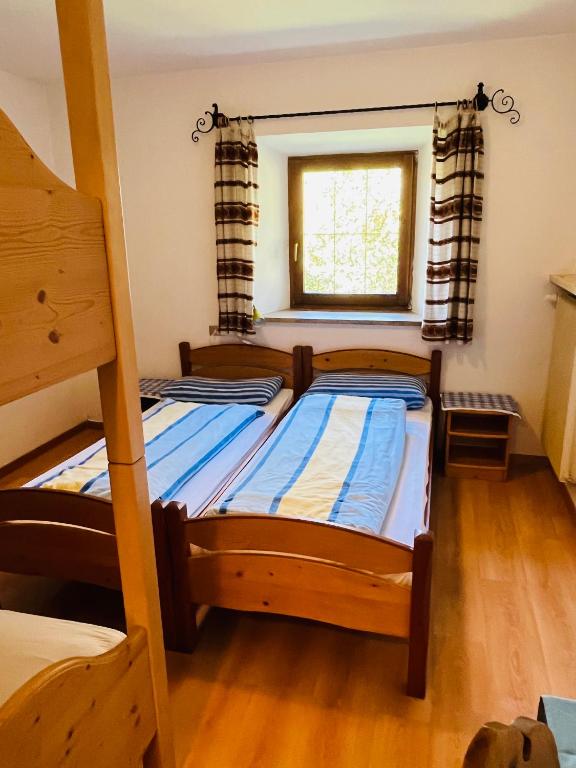 Postel nebo postele na pokoji v ubytování Bruggerhof