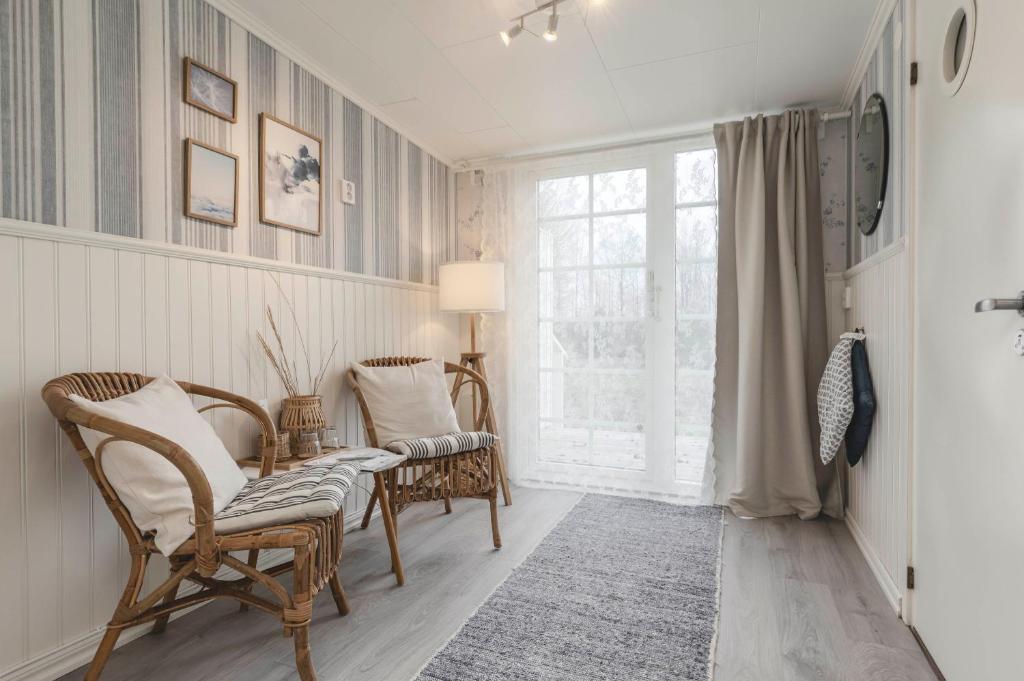 TV a/nebo společenská místnost v ubytování Naya Retreat & Hotell
