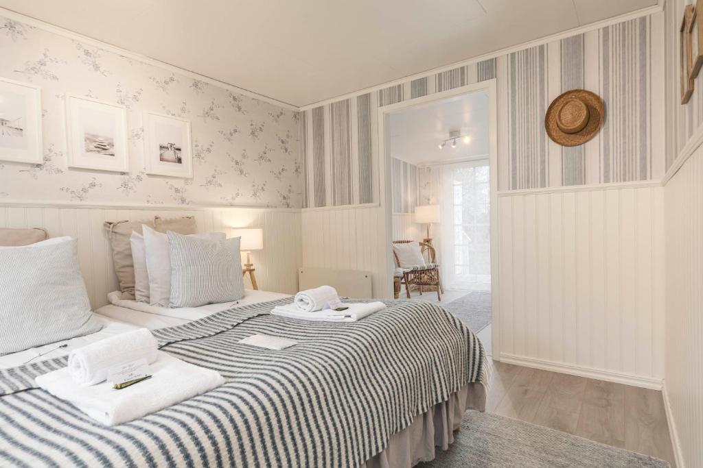 Postel nebo postele na pokoji v ubytování Naya Retreat & Hotell
