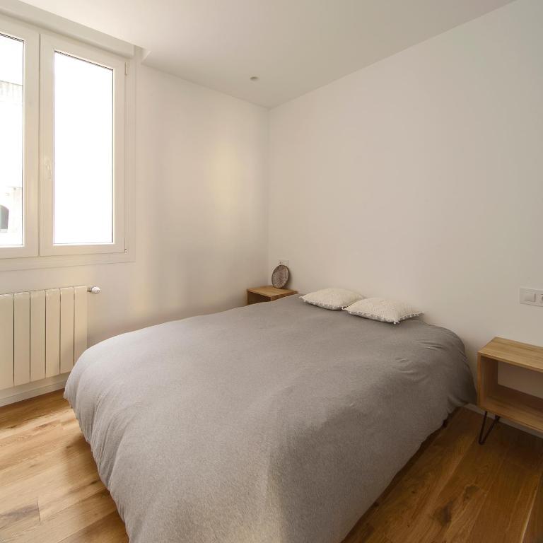 Postel nebo postele na pokoji v ubytování City Centre San Mamés