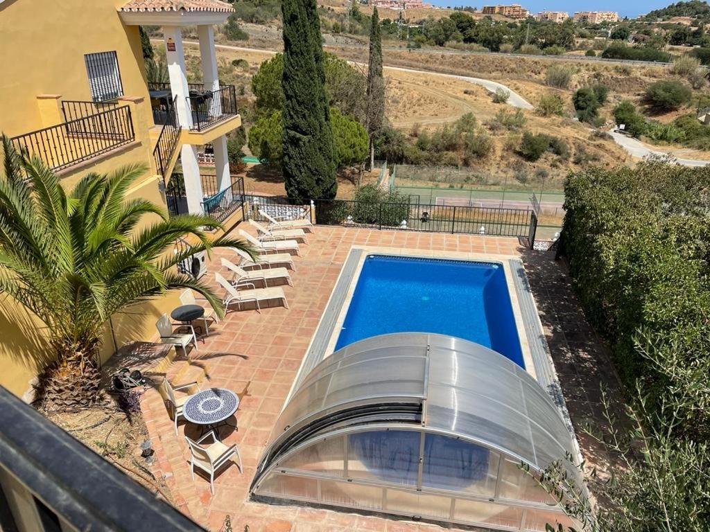 Bazén v ubytovaní Villa Vista Verde -Sea views -3 Bedrooms -Heated Pool alebo v jeho blízkosti