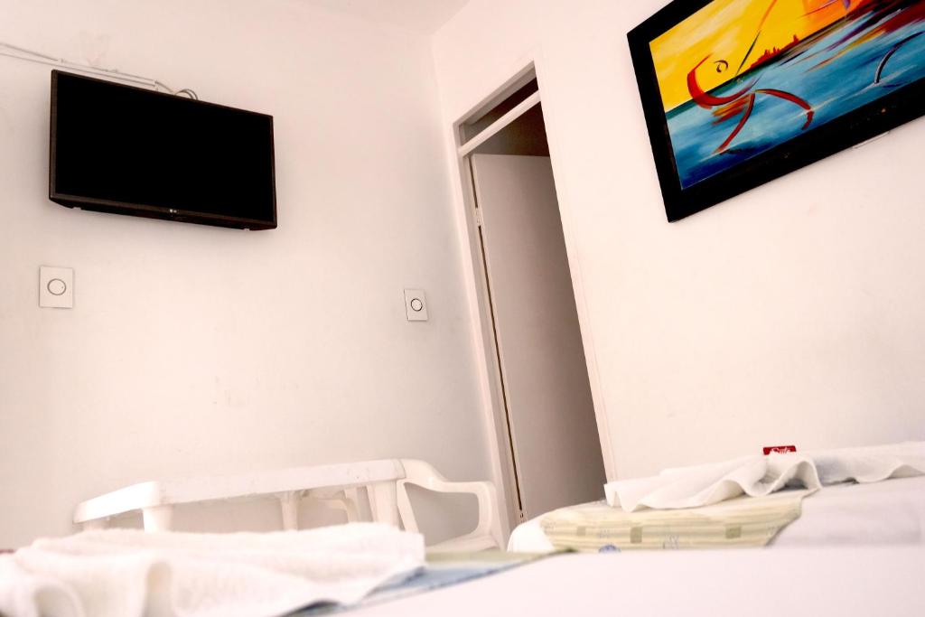 Postel nebo postele na pokoji v ubytování Comodas Habitaciones Hotel Bucaros