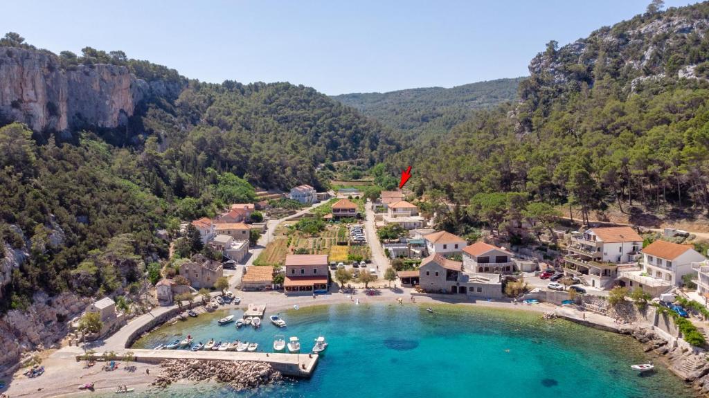 an aerial view of a resort on a lake at Apartments by the sea Cove Vela Stiniva, Hvar - 14511 in Zastražišće