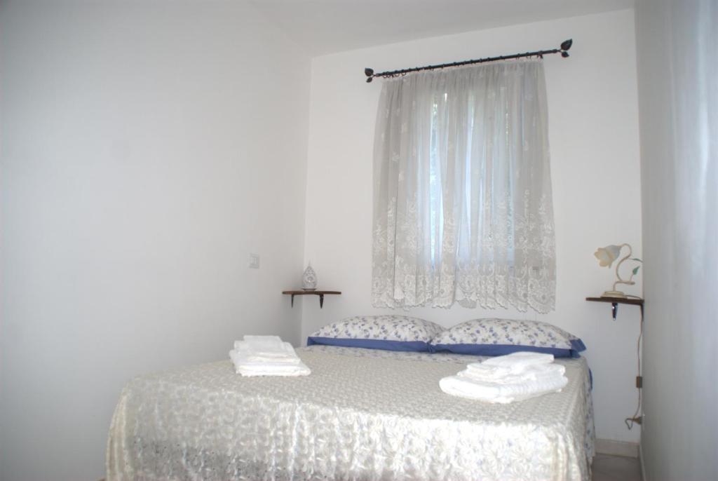 Postel nebo postele na pokoji v ubytování B&B La Selva Santa
