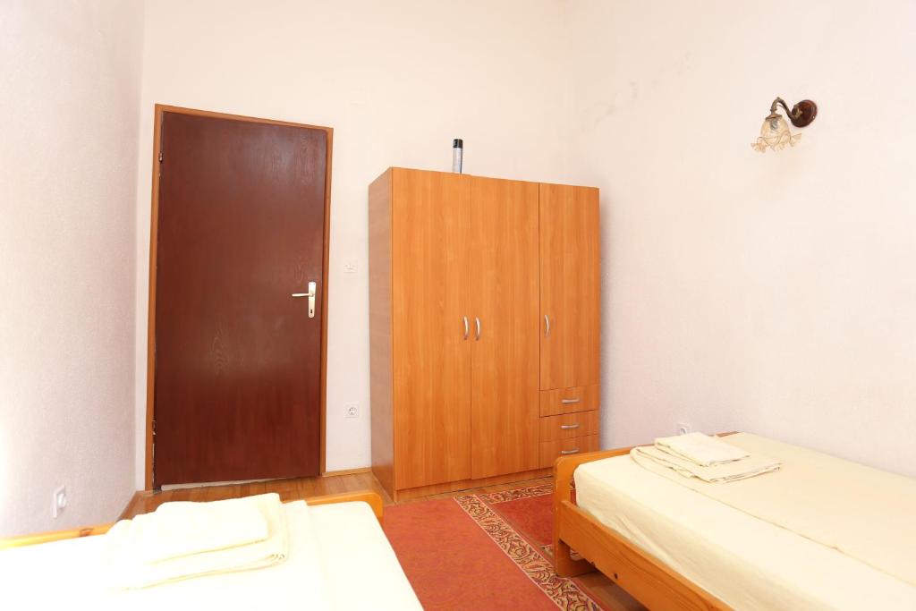 Posteľ alebo postele v izbe v ubytovaní Apartment Slatine 16345a