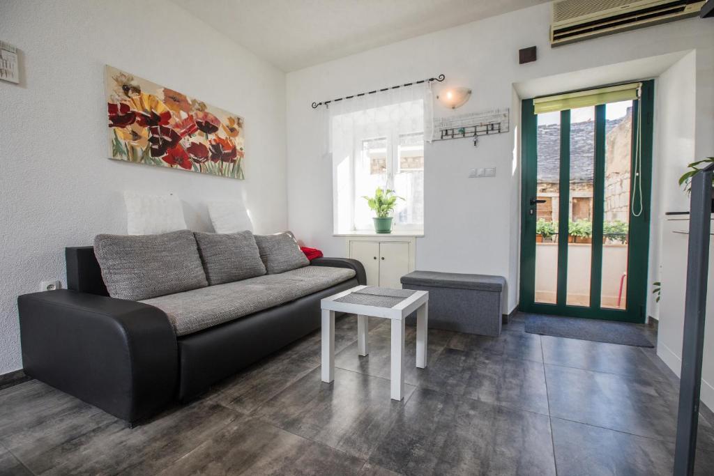 Apartments by the sea Stobrec, Split - 16352 - Two-Bedroom Apartment With Terrace And Sea View