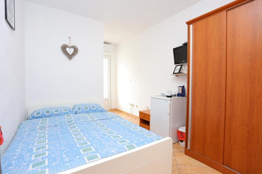 Fotografia z galérie ubytovania Apartments and rooms with parking space Makarska - 16449 v destinácii Makarska