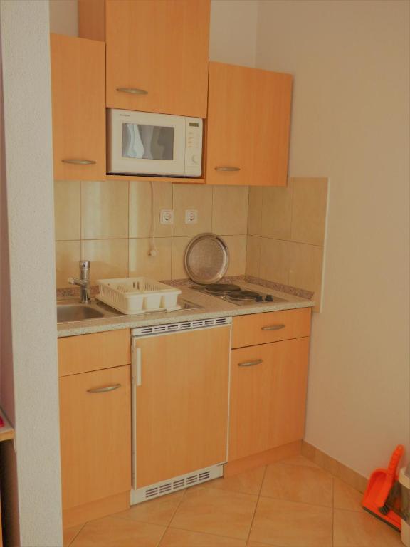 Kuchyňa alebo kuchynka v ubytovaní Apartments with a parking space Baska Voda, Makarska - 16517