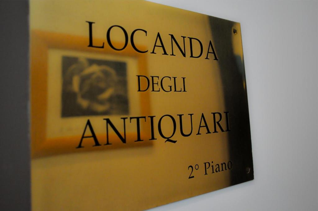 a book with the words london design antwerp at Locanda degli Antiquari in Rome