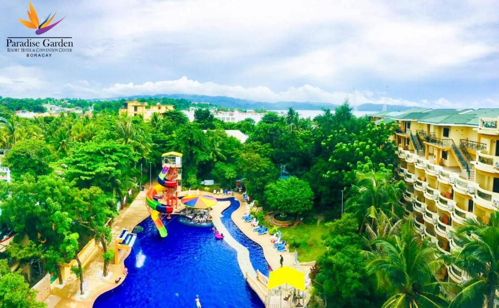 an aerial view of a water park with a water slide at Paradise Garden Hotel and Convention Boracay Powered by ASTON in Boracay