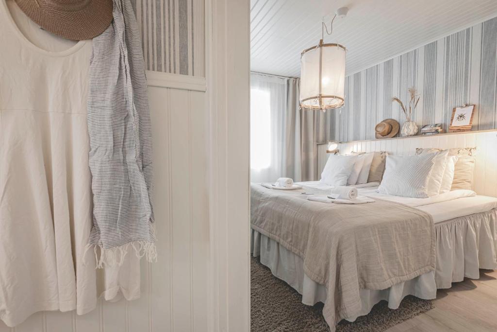 Postel nebo postele na pokoji v ubytování Naya Retreat & Hotell