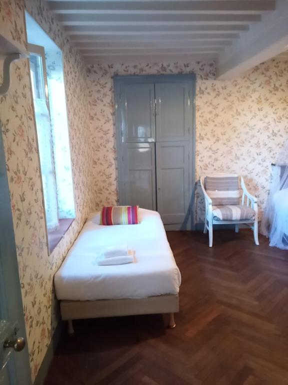 Postel nebo postele na pokoji v ubytování Gite la Longere Morvandelle