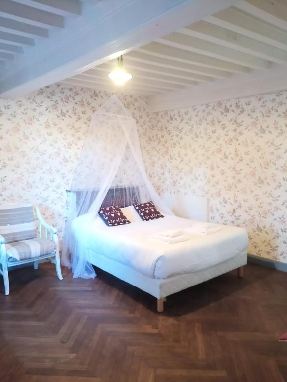 Postel nebo postele na pokoji v ubytování Gite la Longere Morvandelle