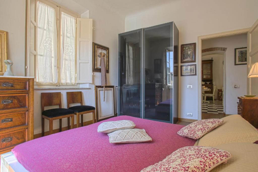 A bed or beds in a room at La Casa dell'Artista