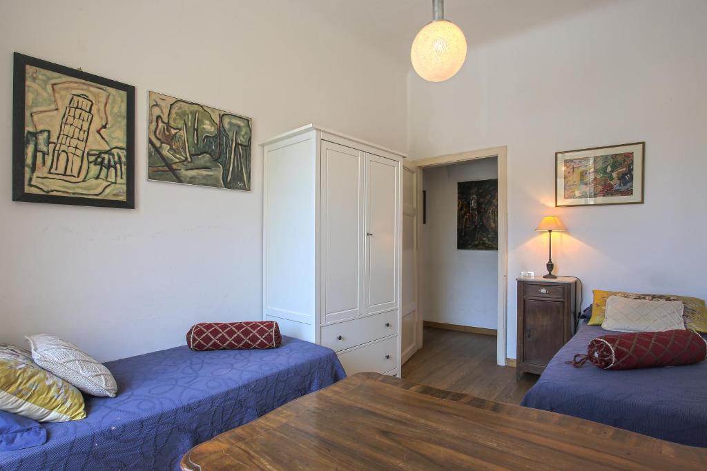 A bed or beds in a room at La Casa dell'Artista