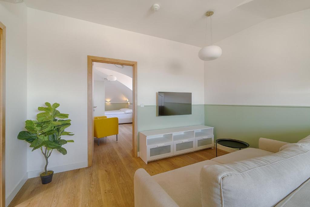 Ένα ή περισσότερα κρεβάτια σε δωμάτιο στο Luma Terra Prague Hostel