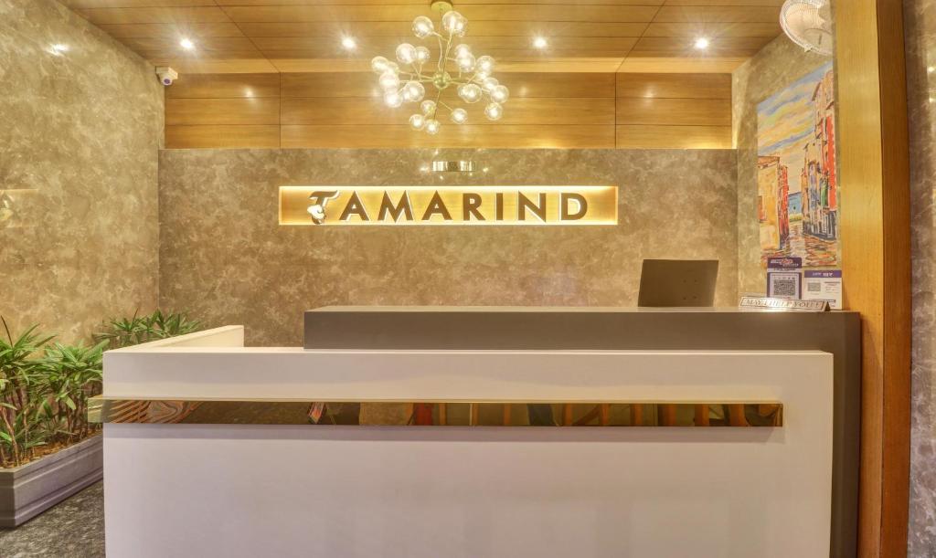a lobby with a sign that says samendron at Treebo Tryst Tamarind in Chandīgarh