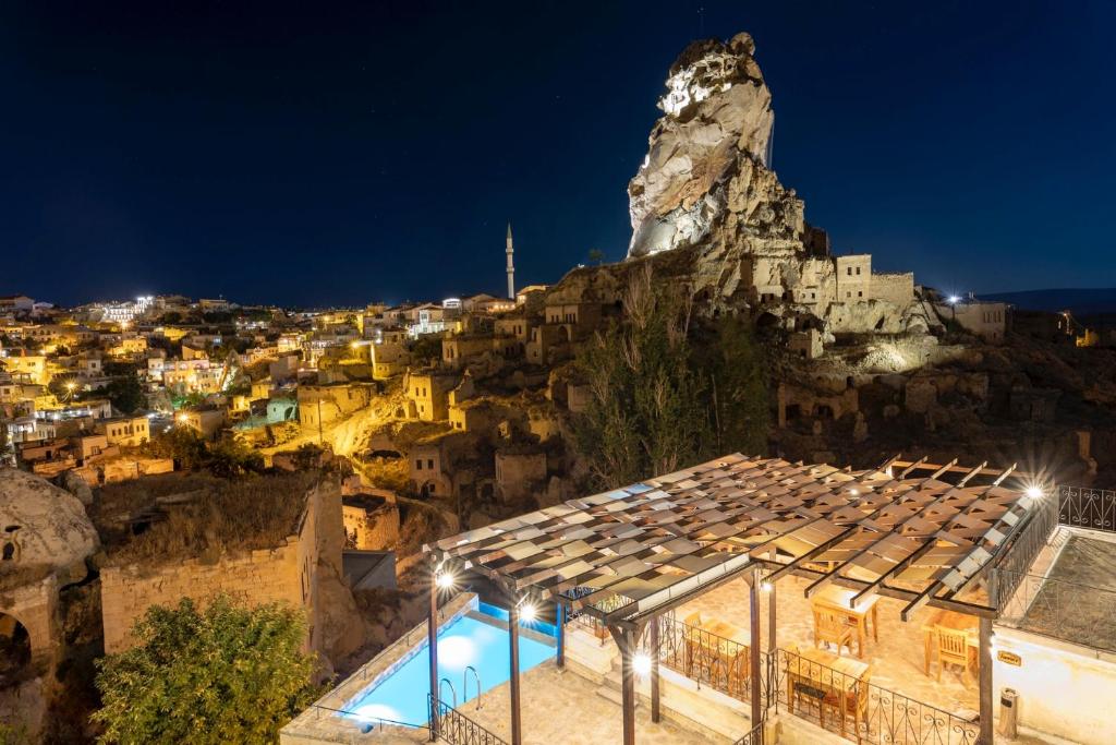 a view of the city of aleppo at night at Portal Cappadocia Hotel in Ortahisar