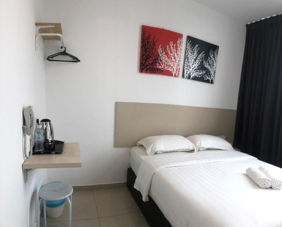 Postel nebo postele na pokoji v ubytování M Design Hotel@KLIA,Sepang