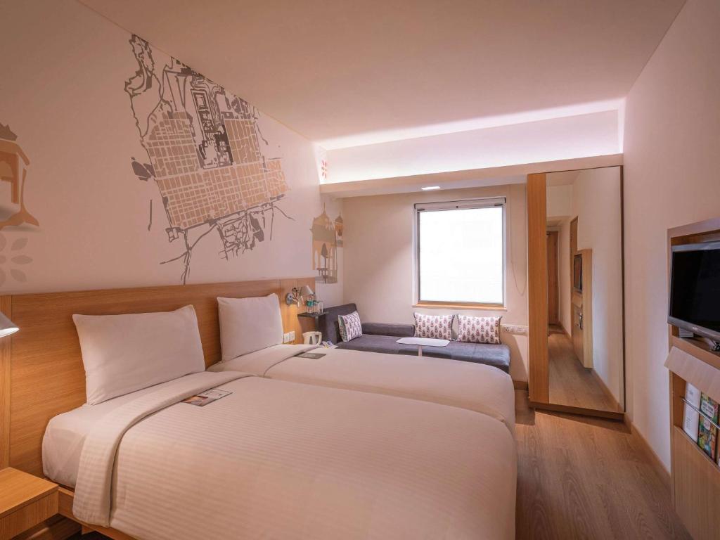 Voodi või voodid majutusasutuse ibis Jaipur City Centre - An Accor Brand toas