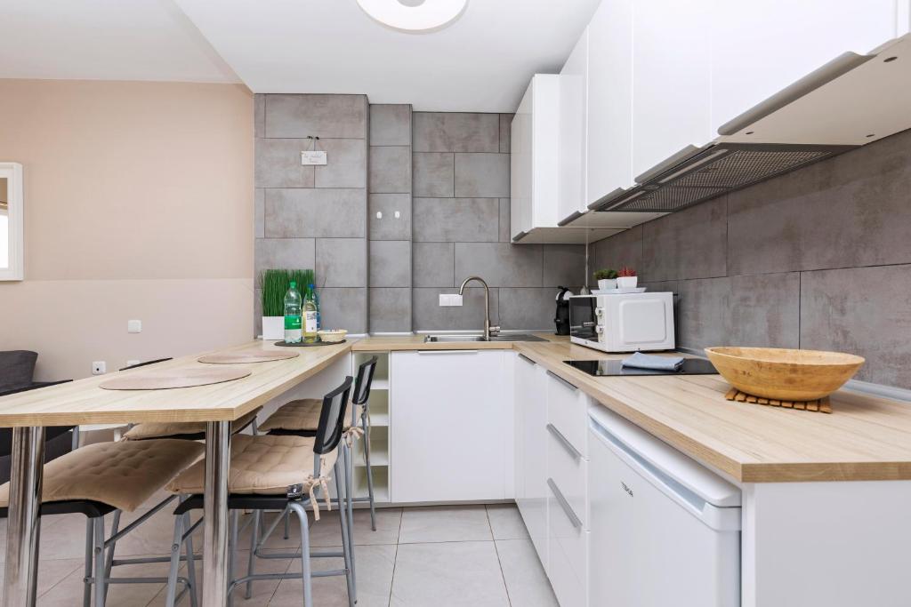 Kuchyň nebo kuchyňský kout v ubytování SMART-Beachview