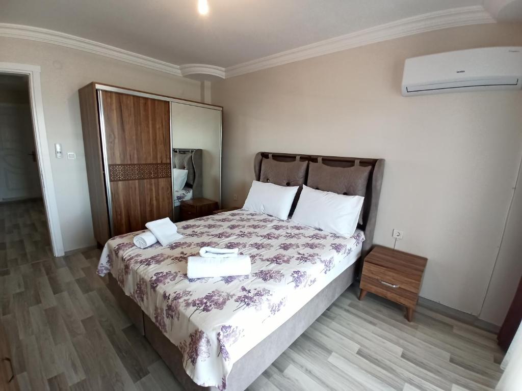 Postel nebo postele na pokoji v ubytování Begonville Villas Ladies Beach