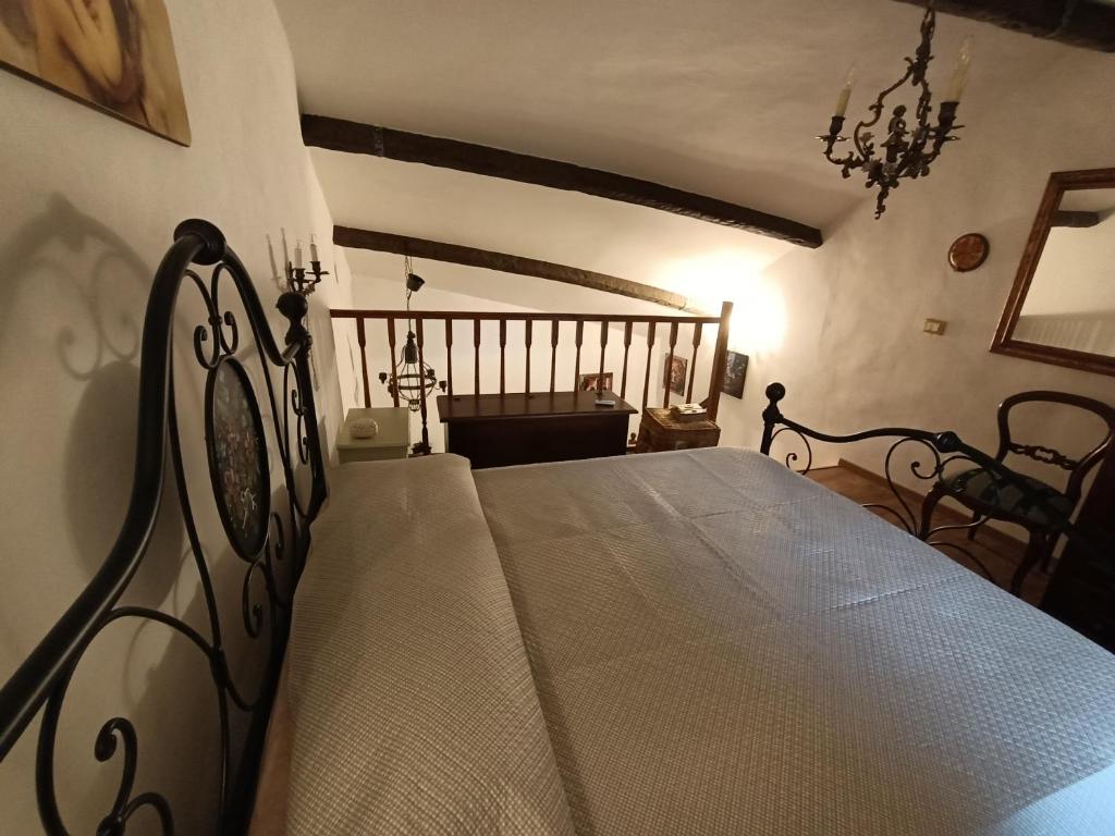 En eller flere senger på et rom på Giglio Vallerano. Alloggio turistico