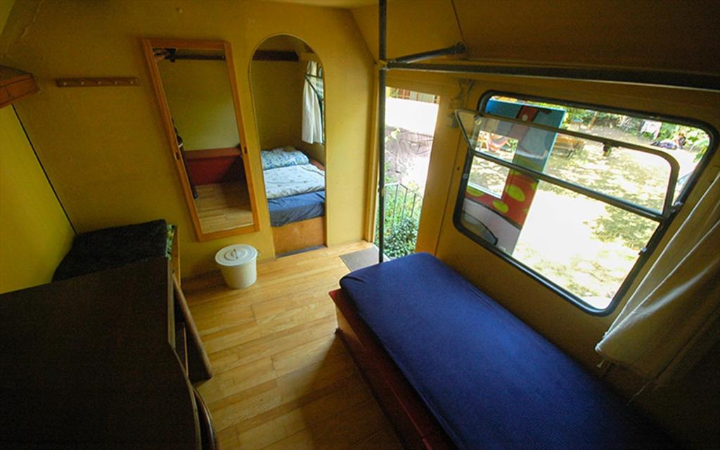 Postel nebo postele na pokoji v ubytování Sandino Summer Camp