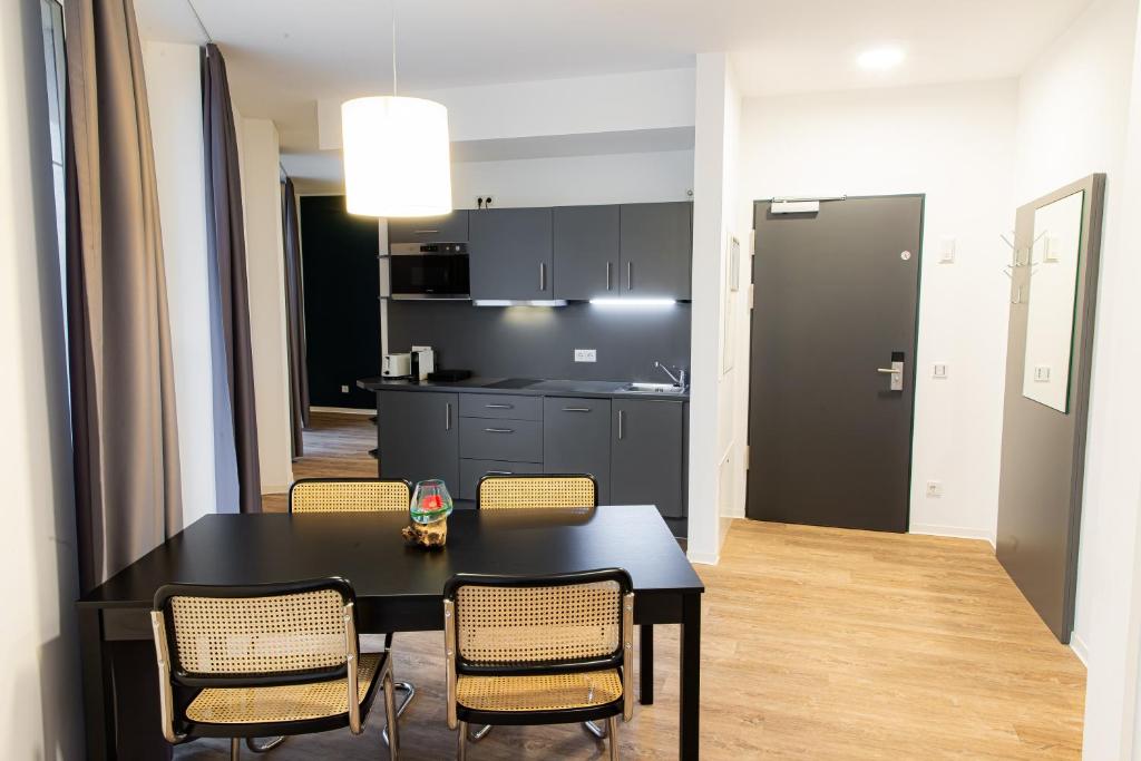 Kuchyň nebo kuchyňský kout v ubytování Das ELB Boardinghouse Hotel Restaurant