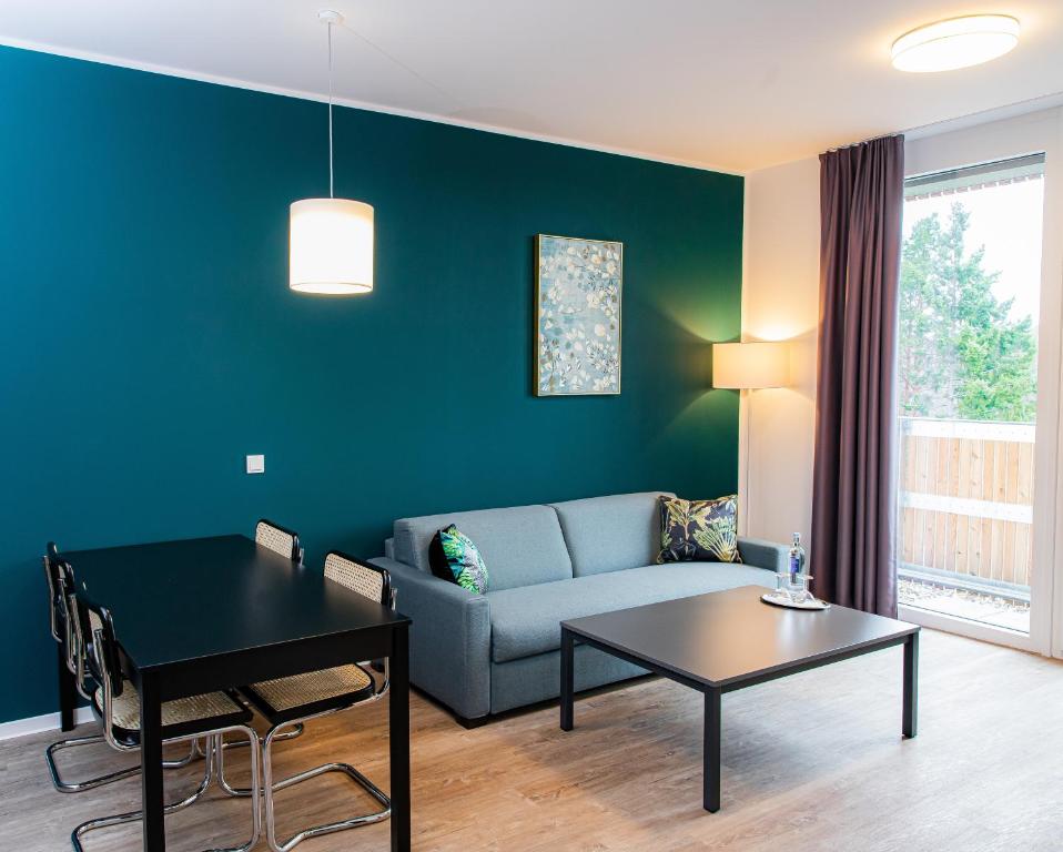 Posezení v ubytování Das ELB Boardinghouse Hotel Restaurant
