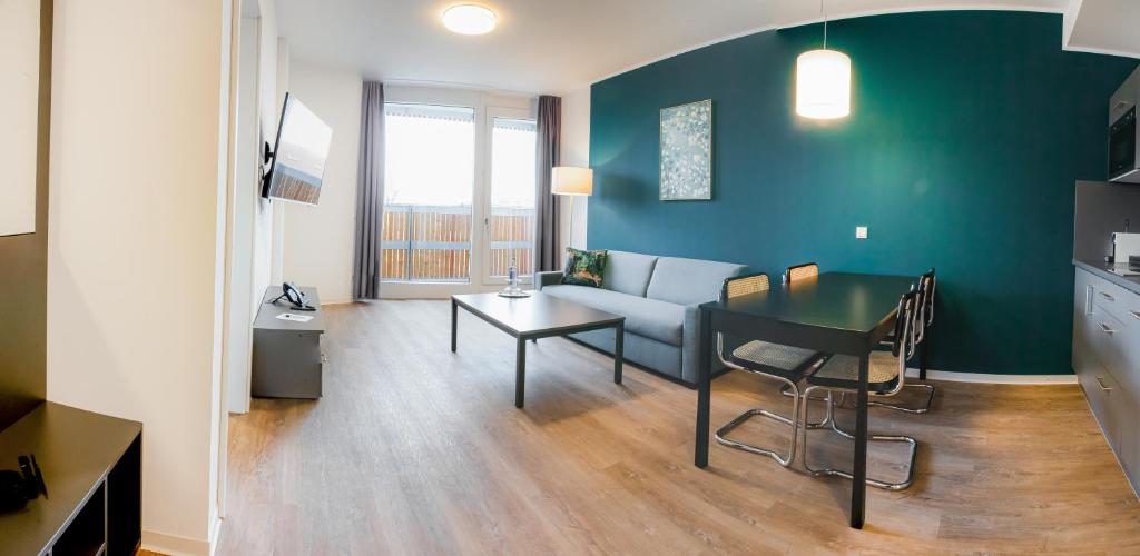Posezení v ubytování Das ELB Boardinghouse Hotel Restaurant
